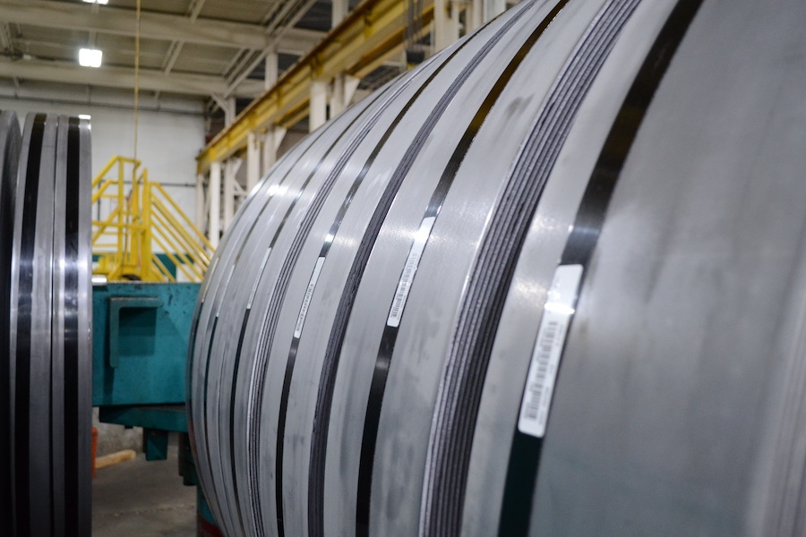 Customer-owned steel coil being reworked at H and H Metal Source in Grand Rapids, Michigan