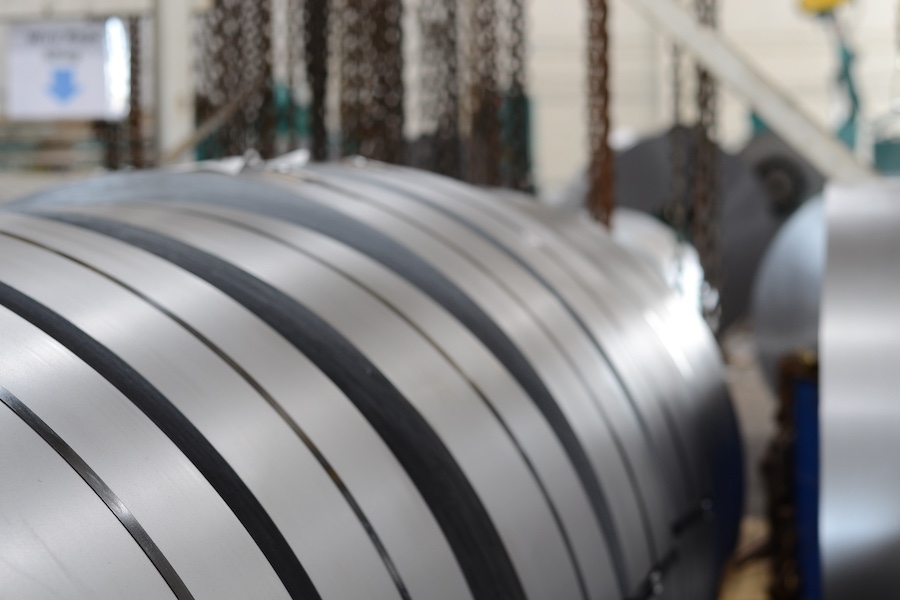 Slitting line producing narrow slit coil at H and H Metal Source in Grand Rapids, Michigan